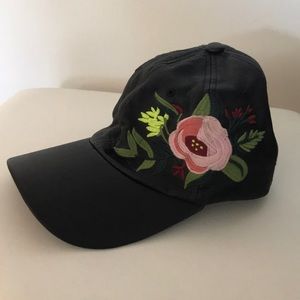 Black faux leather ball cap with floral embroidery